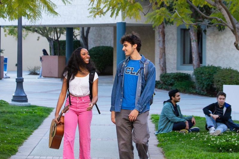 Photo of two students connecting in front of Canyon Point